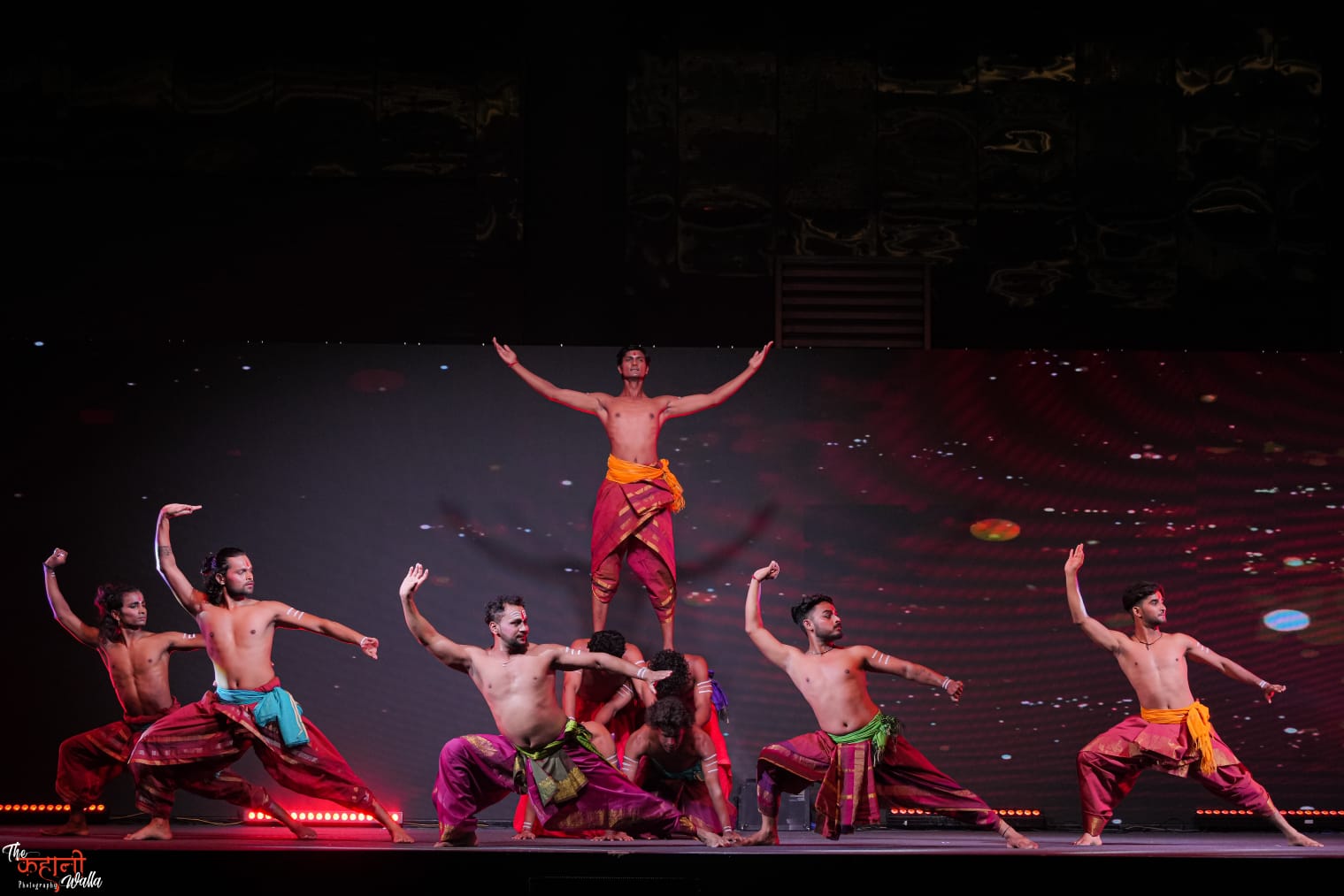 Trikāyaa all-male ensemble human tower formation